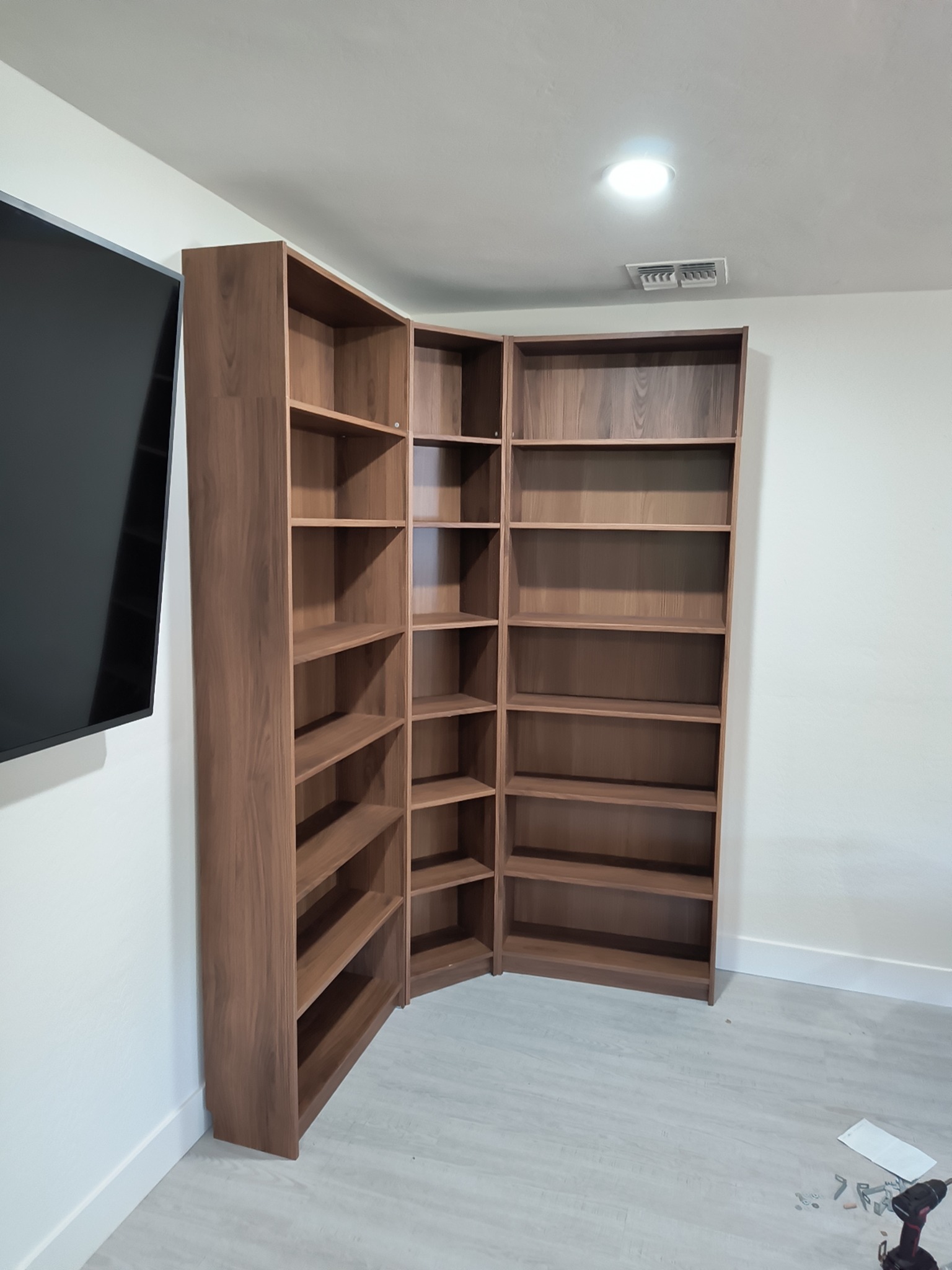 Assembled wooden corner shelving units